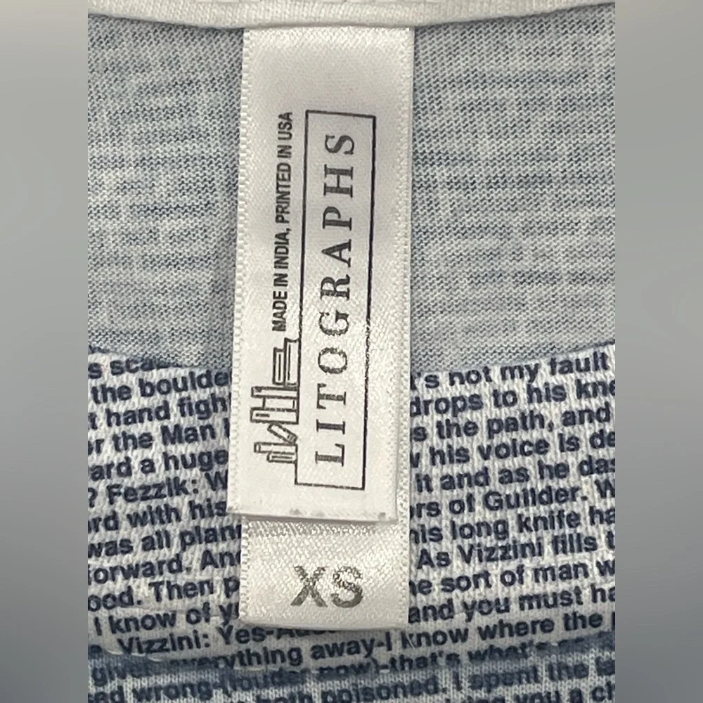 Lithographs soft fabric T shirt.‎ Damaged! Please read description!